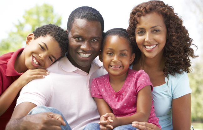 Family Enjoying Day In Park