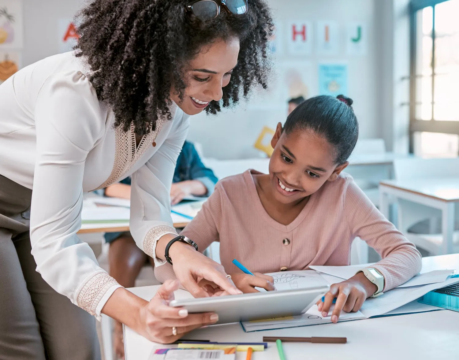 Student receiving academic support through the Voices Community Outreach tutoring program